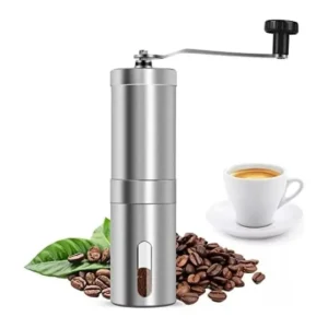 Molino manual de café de acero inoxidable con granos y espresso servido